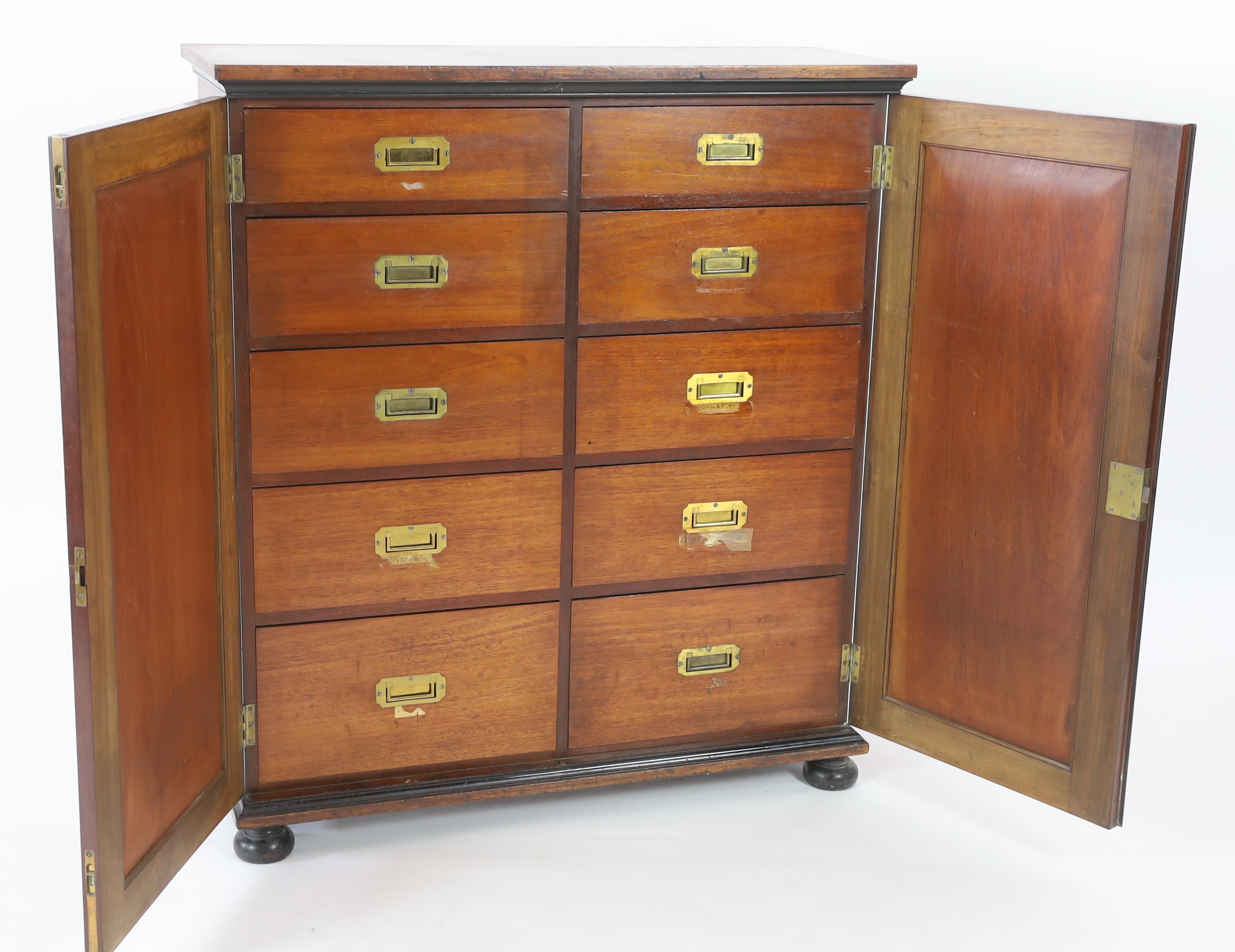 An unusual William IV ebony and mahogany cigar cabinet